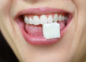 Sugar cube in mouth